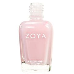 ZOYA Madison lifestyle on coffee table showcasing elegant neutral manicure for everyday wear