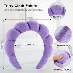 Ztomine headband beside a hand to show size and comfortable coverage benefit