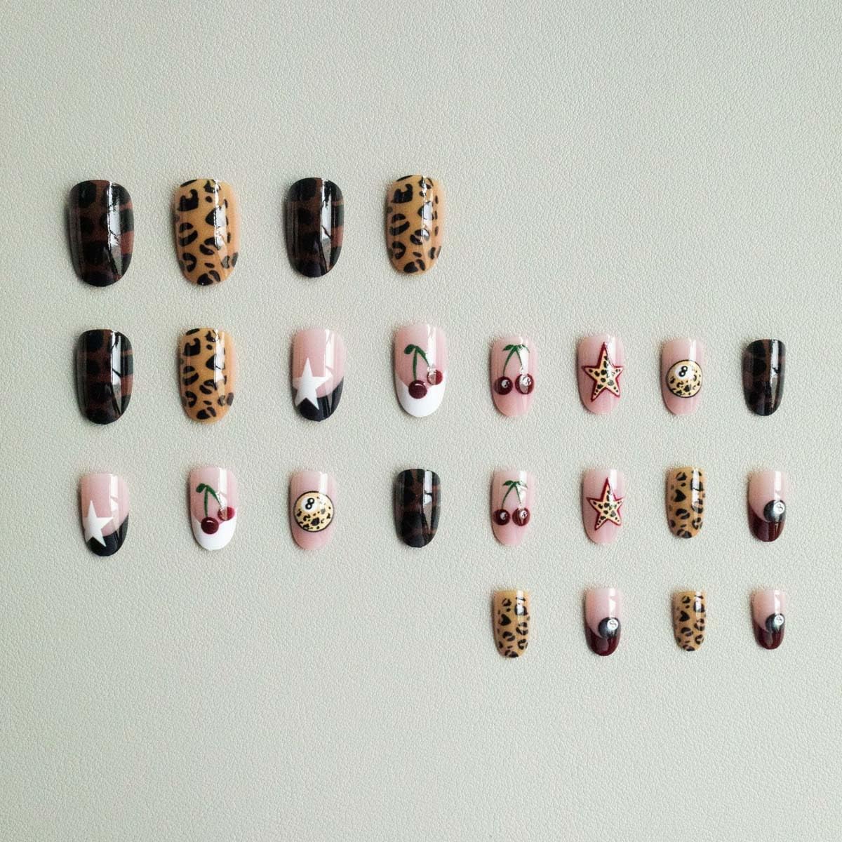 ZWENJIE close-up of leopard French tip detail showcasing crisp print and salon finish