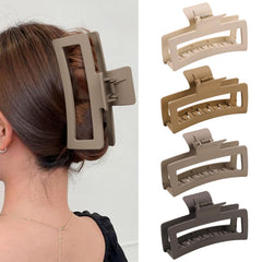 ZYTJ front view of four brown-tone matte claw clips, stylish neutral set