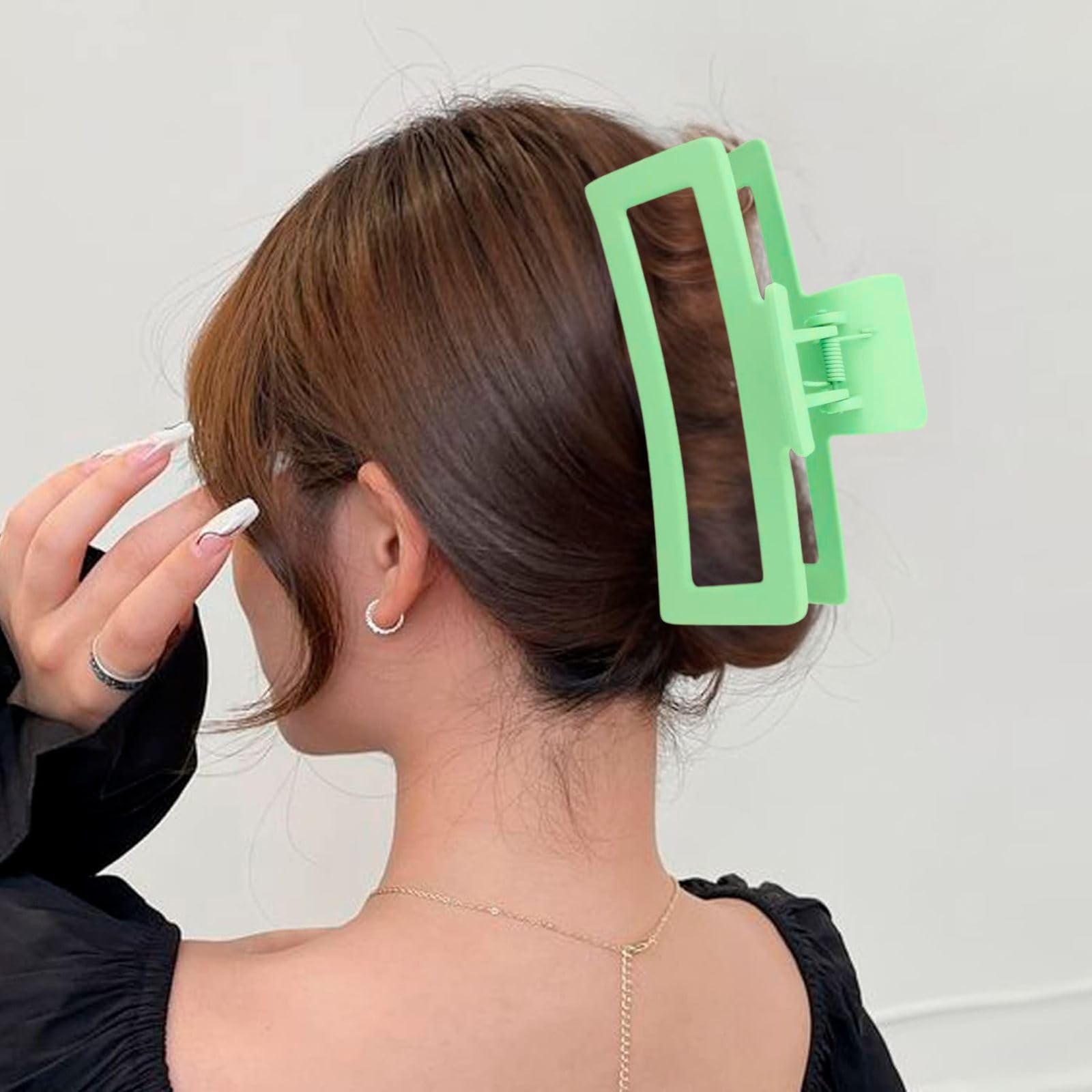 ZYTJ clip securing a bun to keep thick hair neatly in place